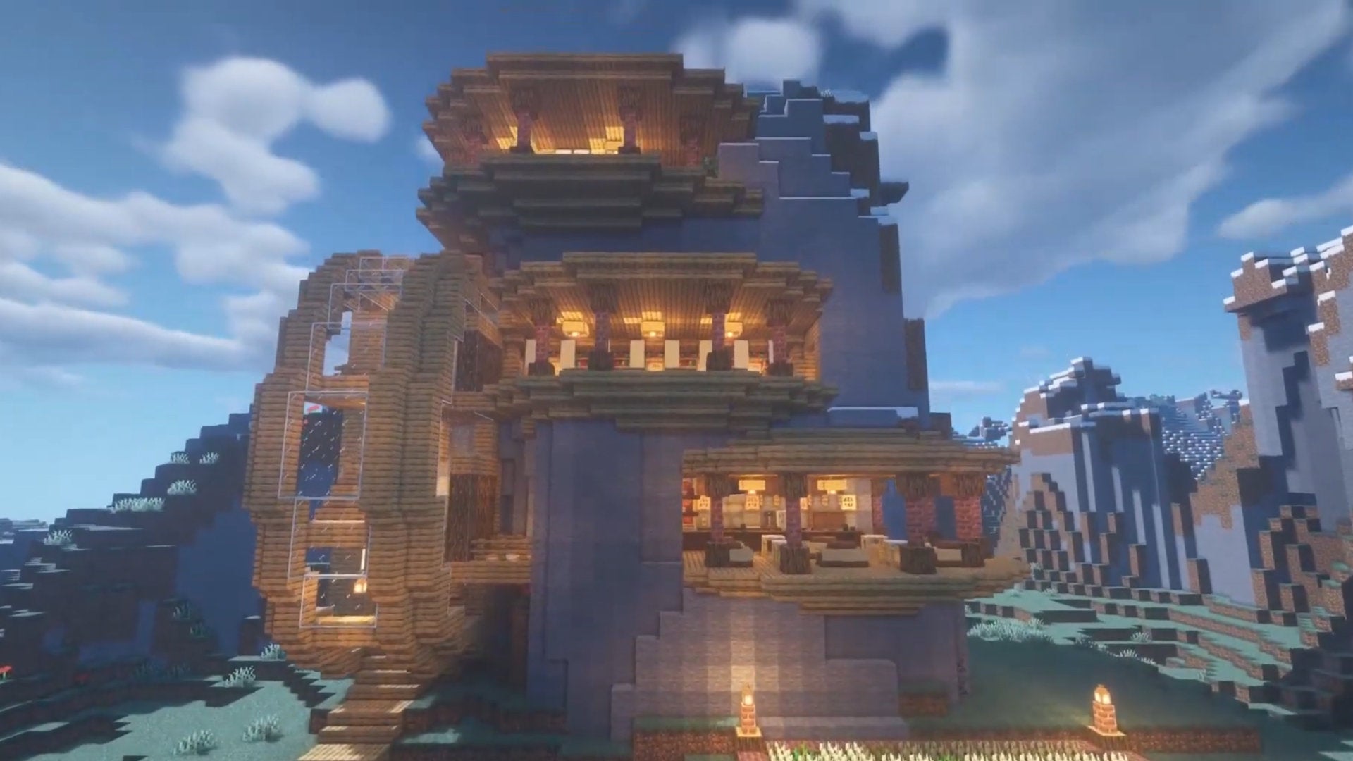 A screenshot of a Minecraft mountain base build.