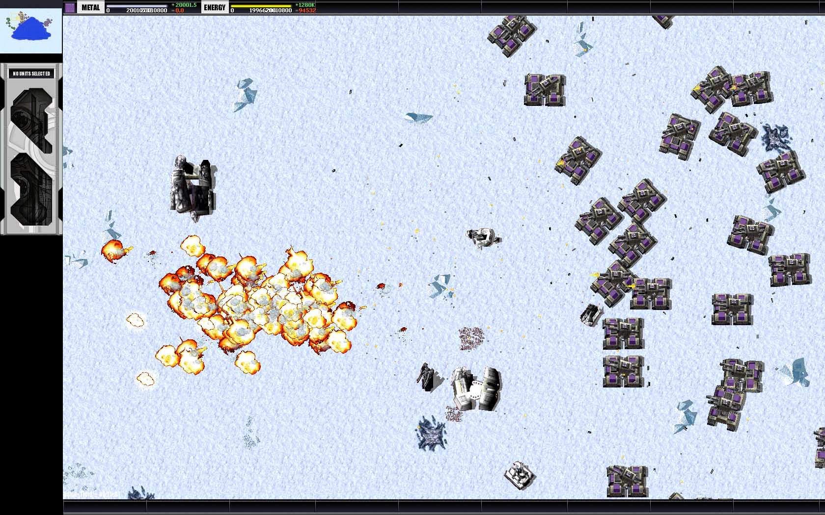 An overhead shot of several tanks blowing up an enemy unit on a snowy landscape in Total Annihilation