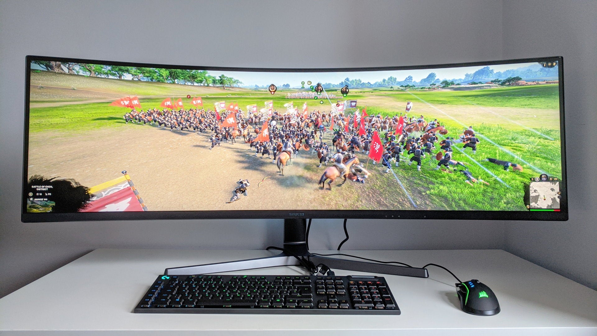 A photo of an ultrawide gaming monitor running Total War: Three Kingdoms