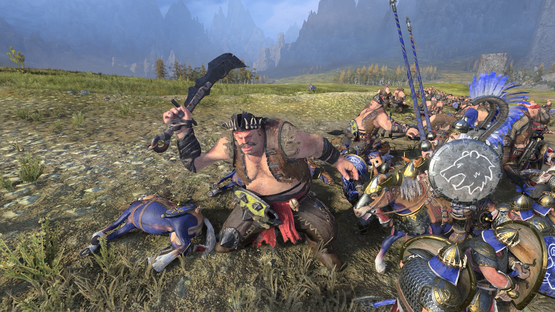 An ogre from Total War: Warhammer 3 swings a scimitar into the oncoming enemy front line