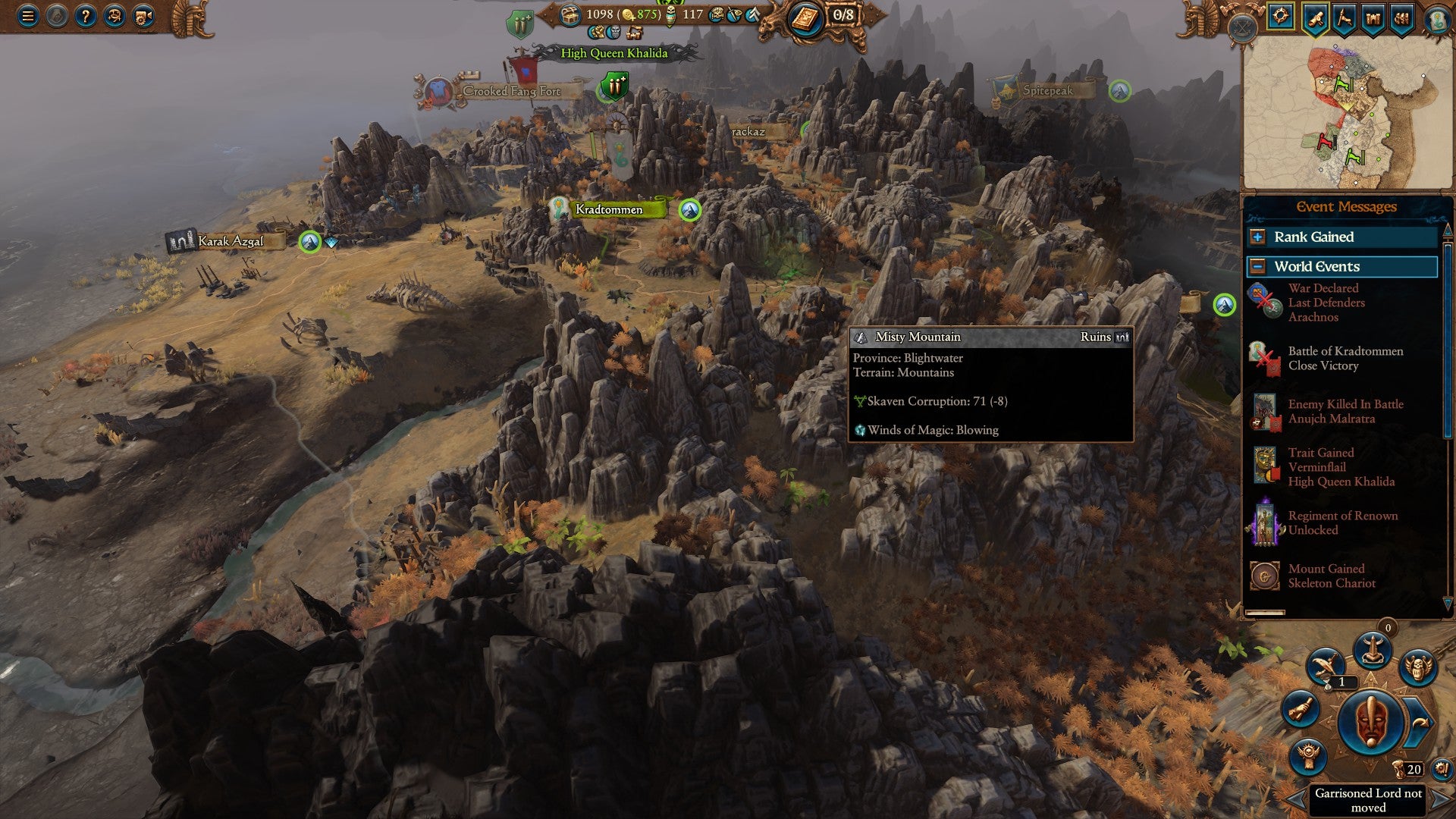 A partially zoomed-out view of a rocky desert area littered with bones in Total War Warhammer 3 Immortal Empires, showing the location of some different factions