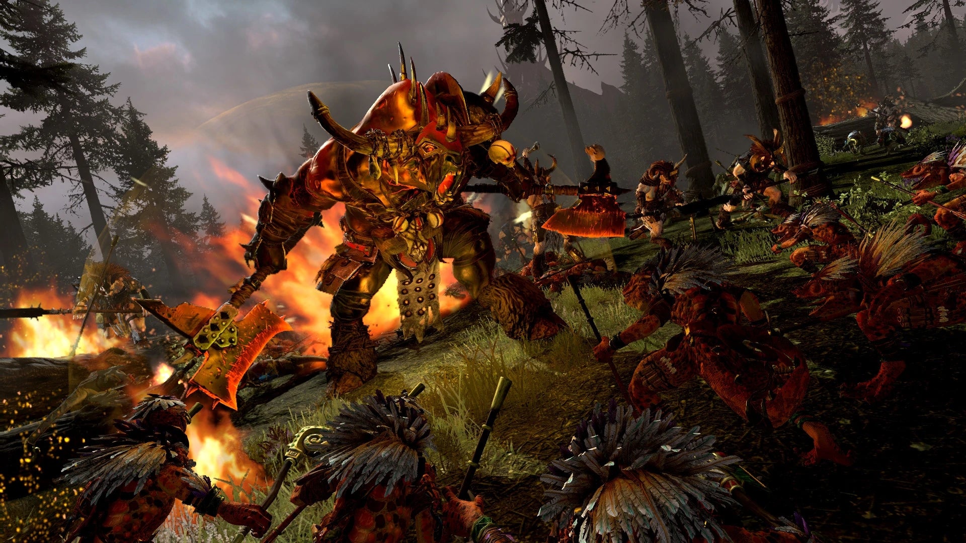 A large raging bull character roars in a forest battlefield scene in Total War: Warhammer 2