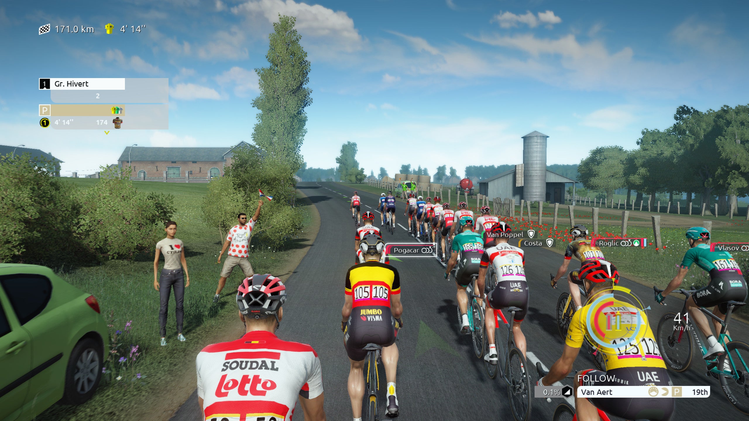 Racing through the countryside in the Tour de France 2022 video game.