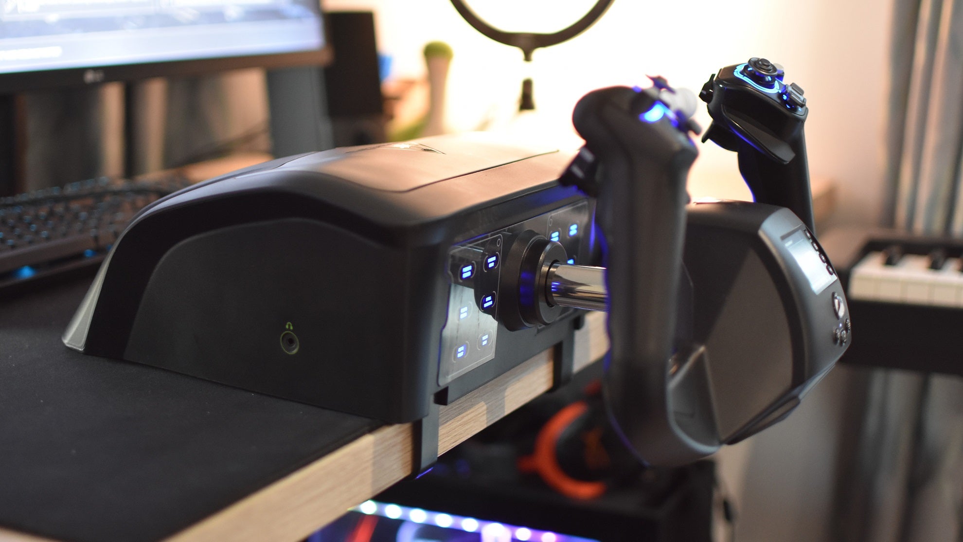 A side view of the the Turtle Beach VelocityOne Flight controller on a desk.