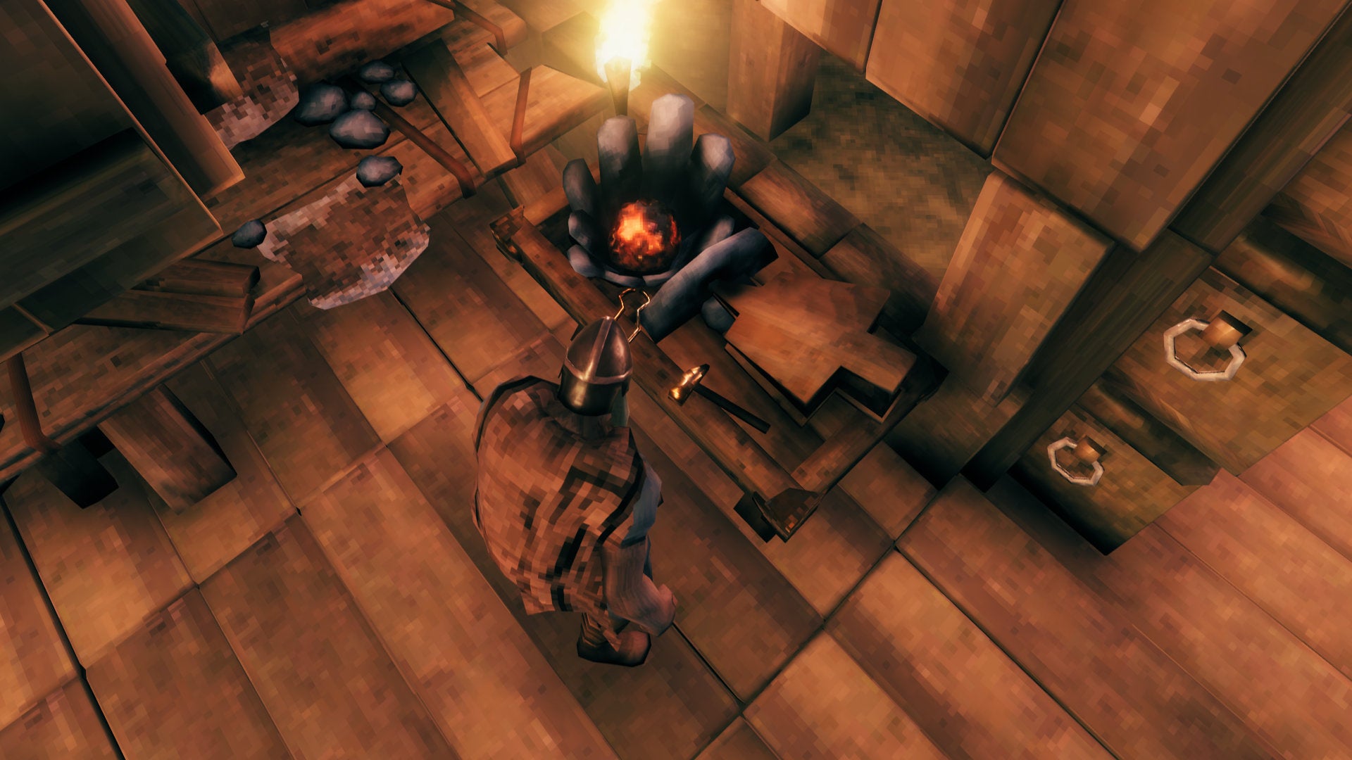 A Valheim screenshot of a Forge placed inside a house, with the player looking down at it.