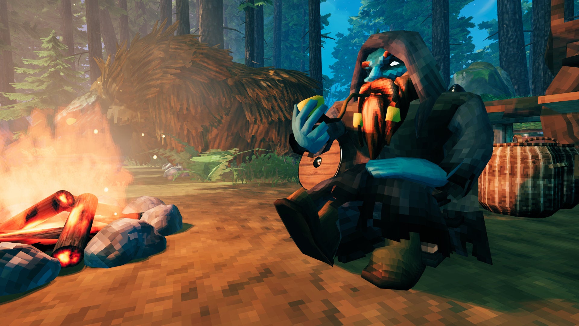 A Valheim screenshot of Haldor the Trader sitting by the fire, smoking a pipe, with Halstein, his beast of burden, in the background.