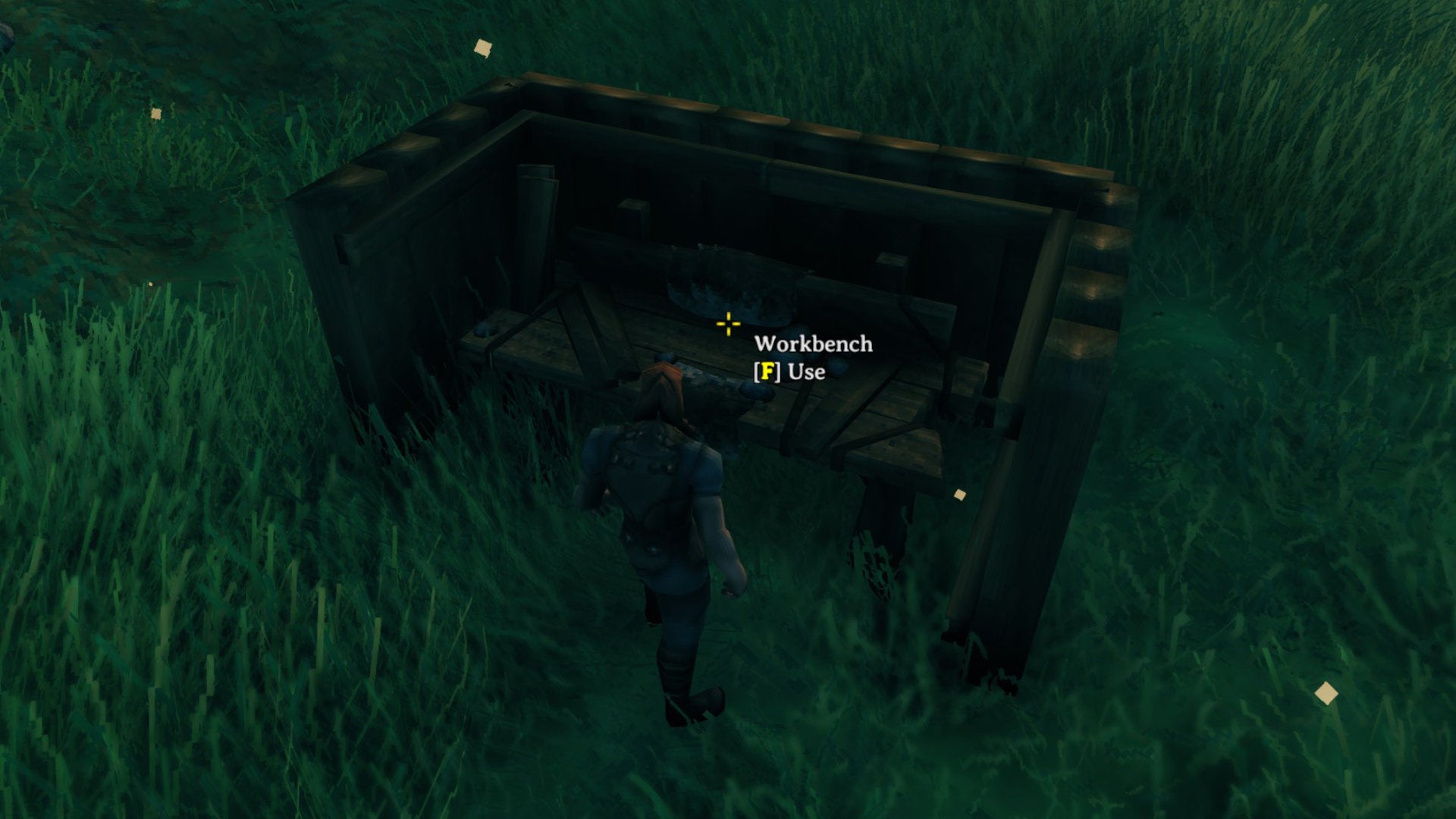 A Valheim screenshot of a Workbench surrounded by four Wooden Walls in a "U" shape.
