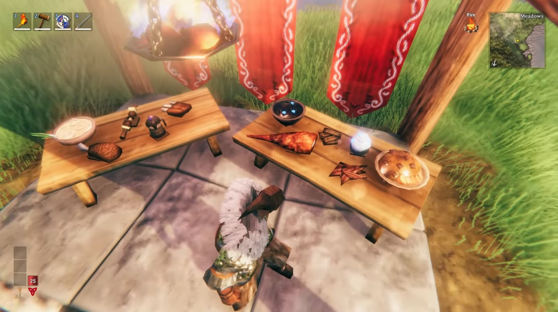 Valheim - New foods for the Hearth & Home update such as cooked boar meat are displayed on two tables beside a viking player.