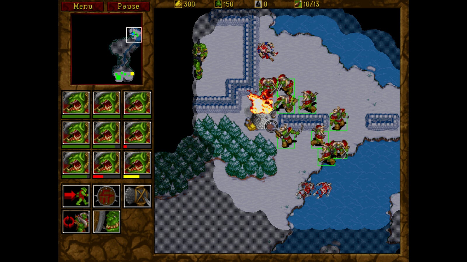 Orcs attack a human outpost in Warcraft II: Tides Of Darkness