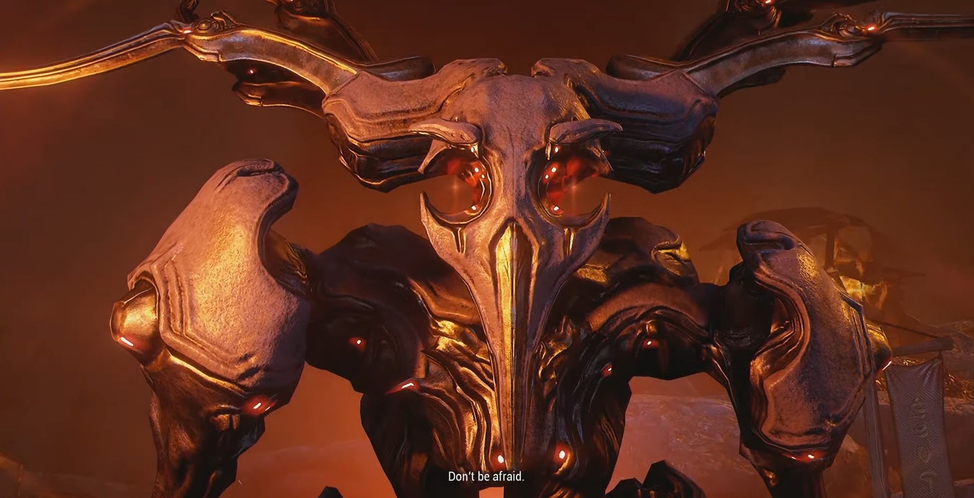 A screenshot of Warframe showing a terrible giant. The subtitle reads, "Don't be afraid."