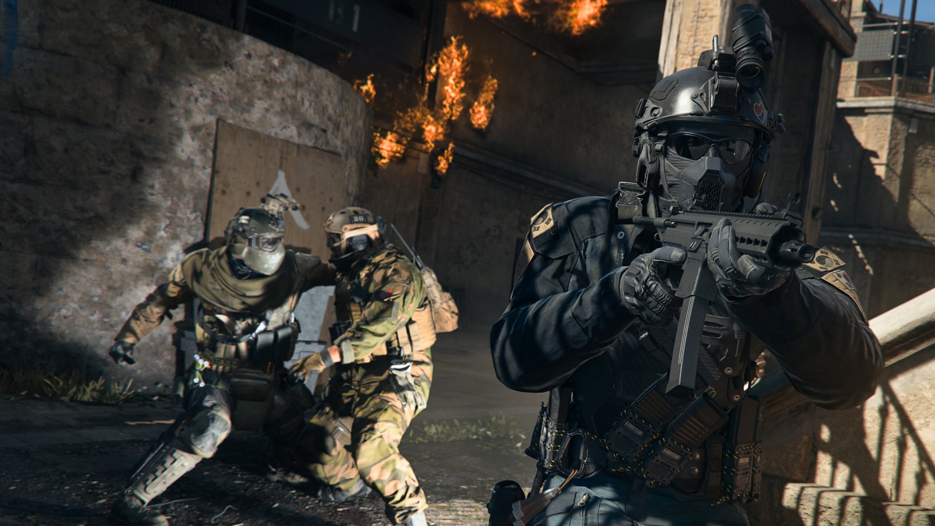 A soldier aims their SMG past the camera while two more soldiers have a knife-fight behind them in Warzone 2.0.