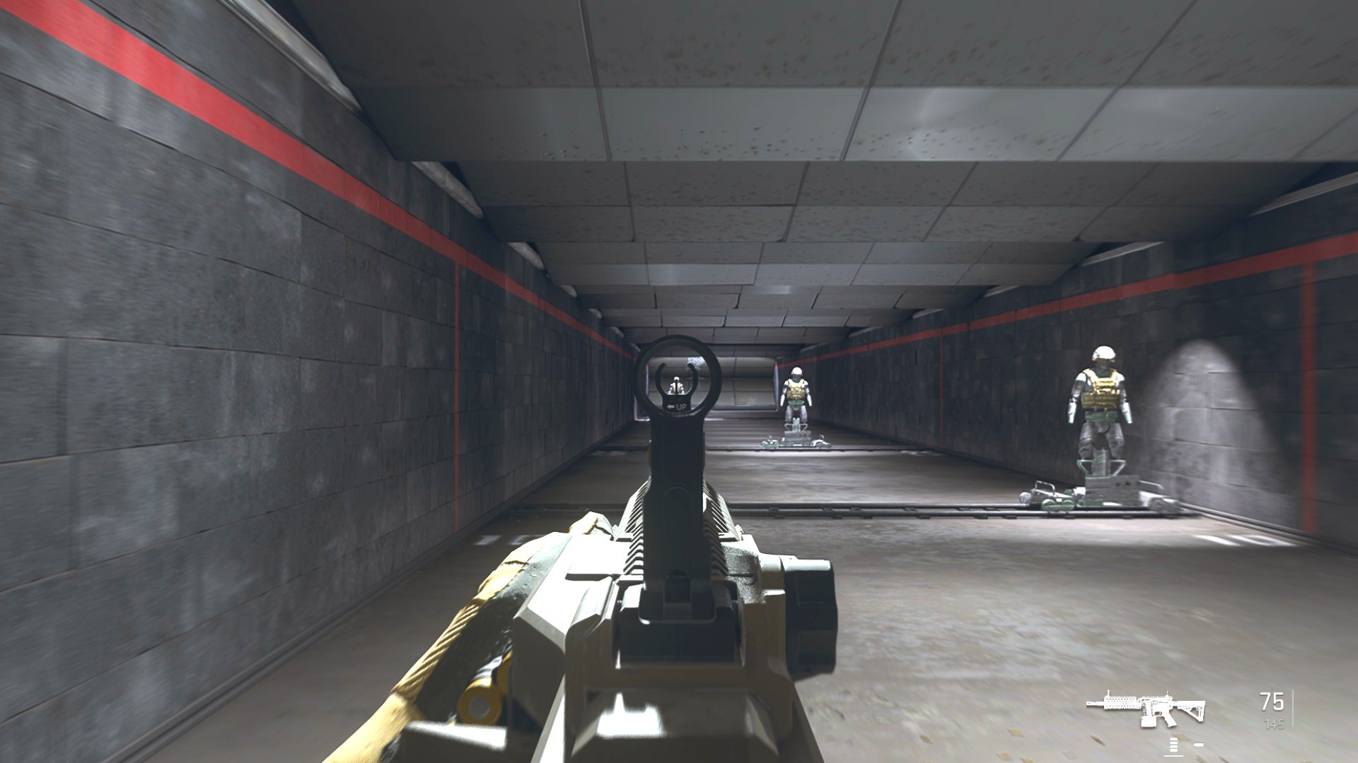The player in Warzone 2.0 aims at a training dummy with the 556 Icarus ironsights.