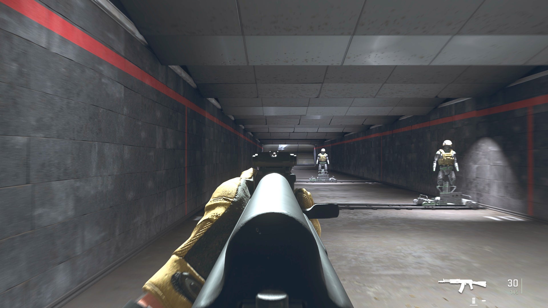 The player in Warzone 2.0 aims at a training dummy with the Kastov 545 ironsights.