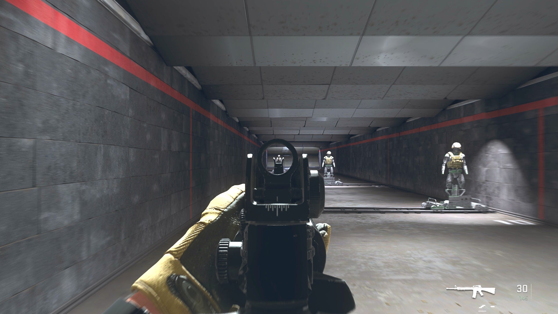 The player in Warzone 2.0 aims at a training dummy with the M16 ironsights.