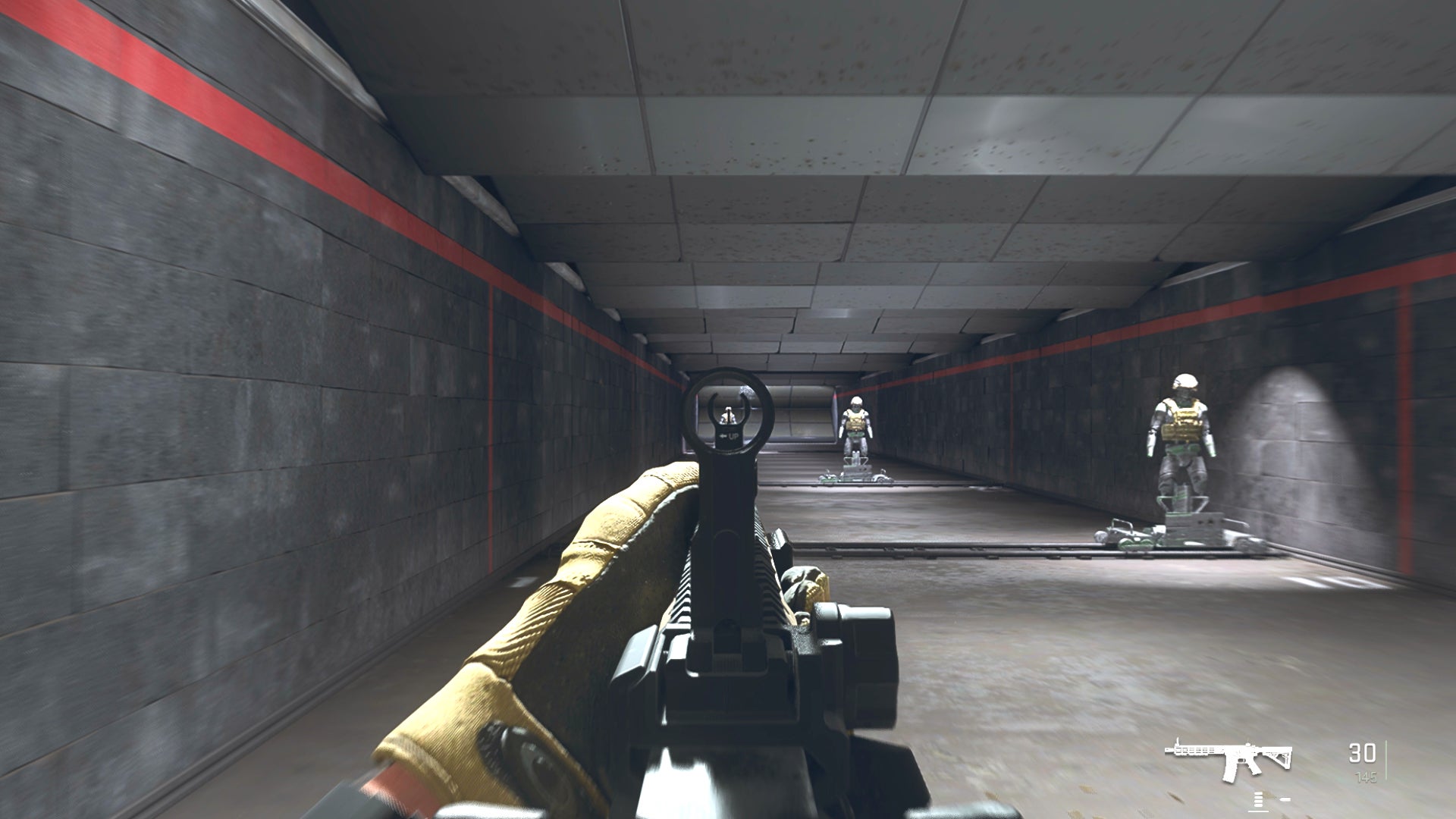 The player in Warzone 2.0 aims at a training dummy with the M4 ironsights.