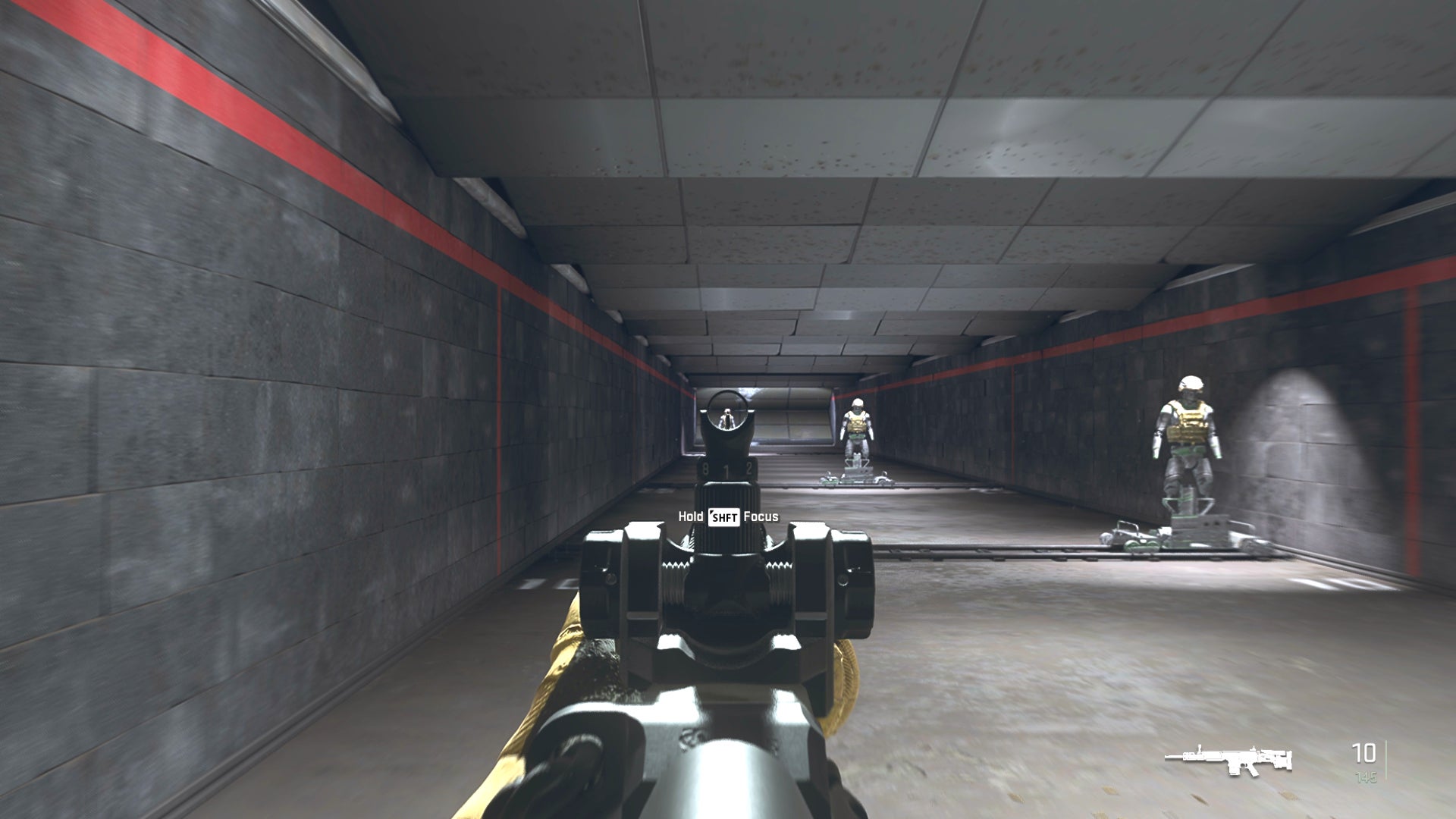 The player in Warzone 2.0 aims at a training dummy with the TAQ-M ironsights.
