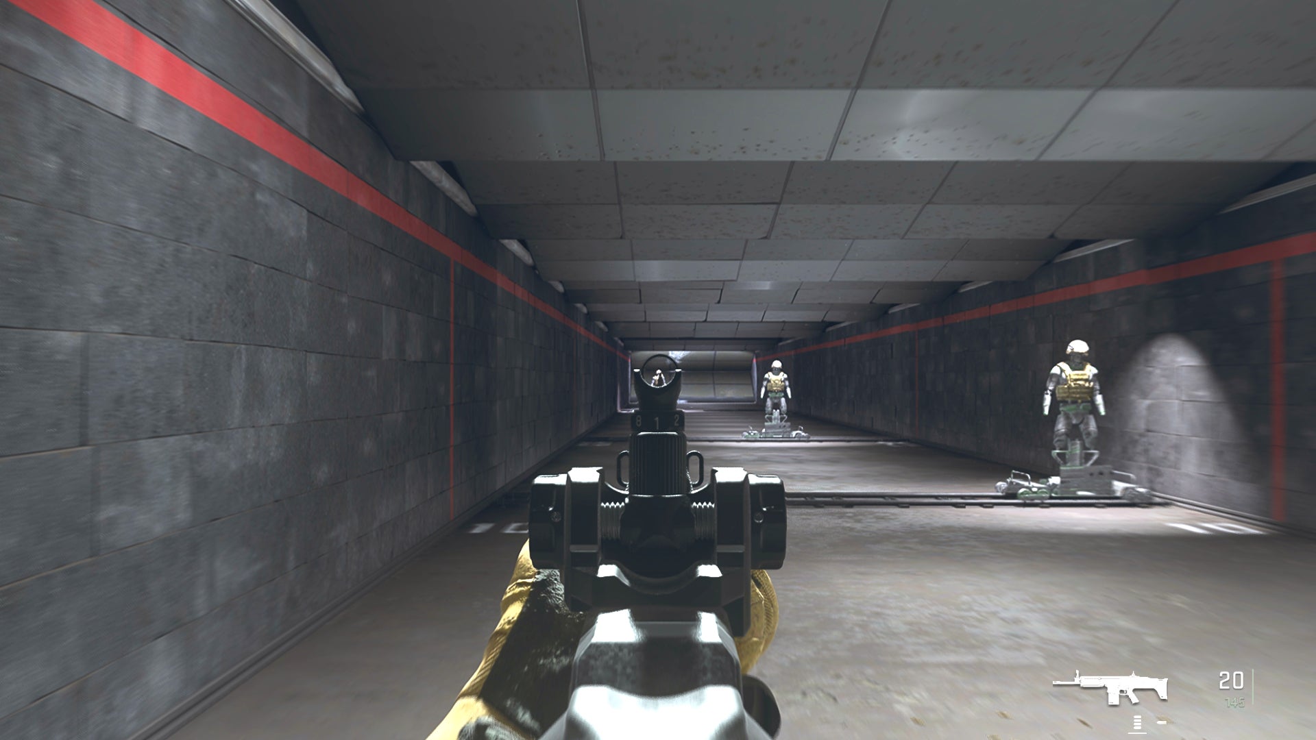 The player in Warzone 2.0 aims at a training dummy with the TAQ-V ironsights.