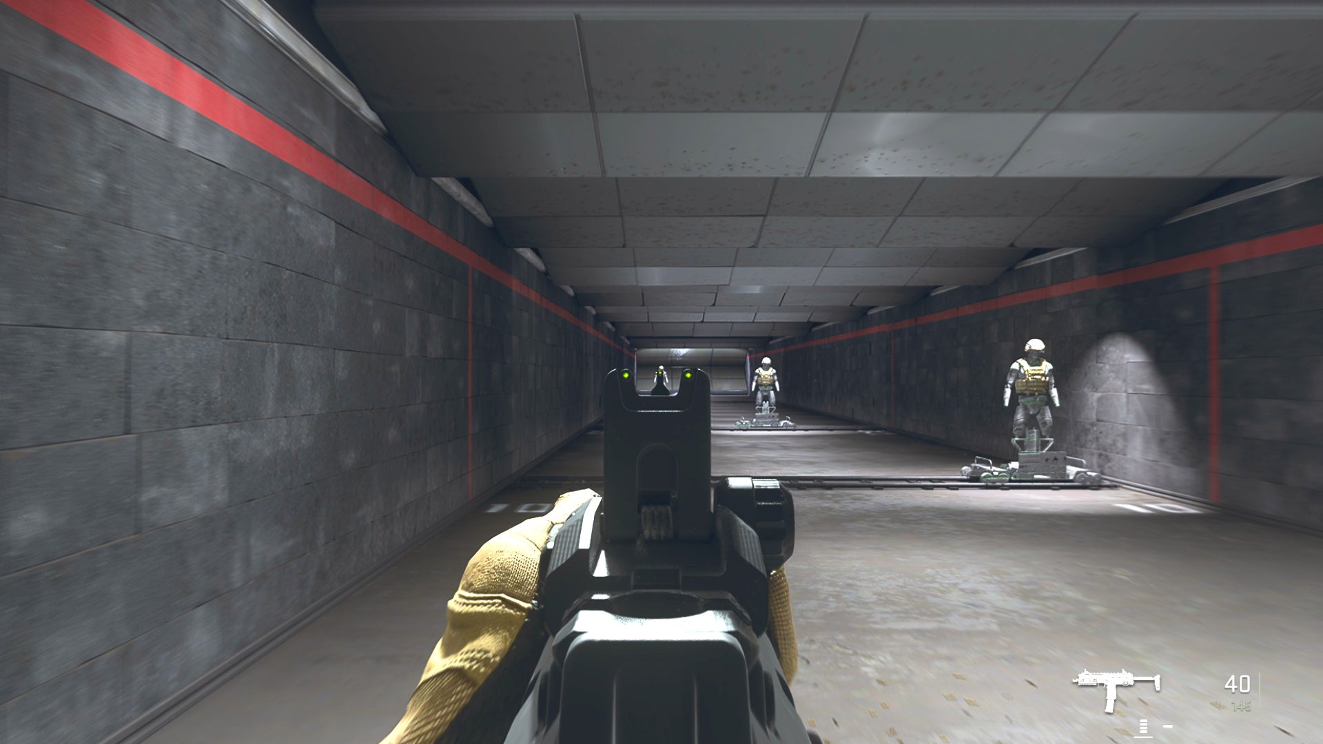 The player in Warzone 2.0 aims at a training dummy with the Vel 46 ironsights.