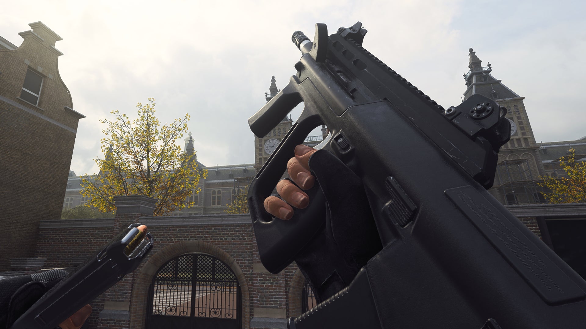 The player in Warzone 2.0 inspects their weapon, the MX9.