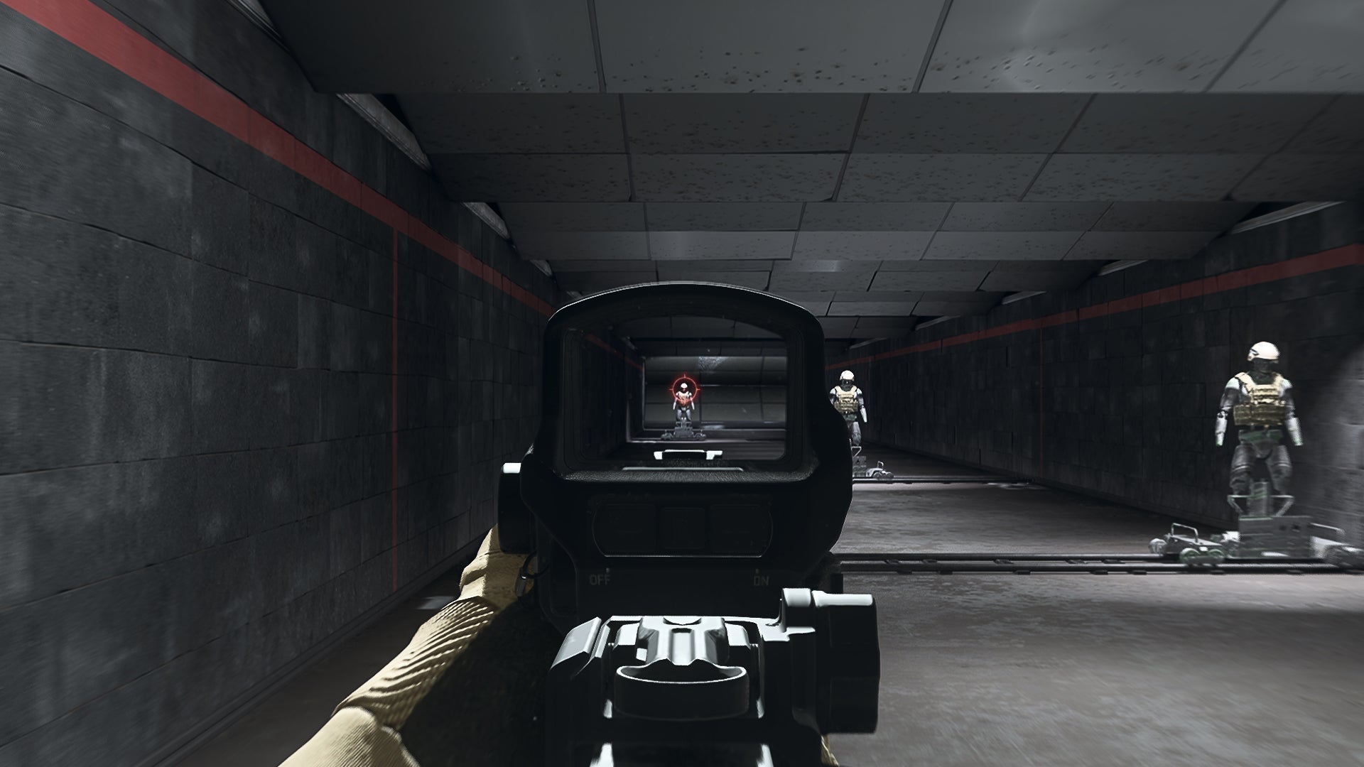 The player in Warzone 2.0 aims at a training dummy using the Corio Enforcer Optic optic attachment.