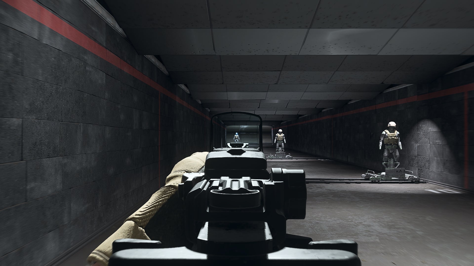 The player in Warzone 2.0 aims at a training dummy using the Cronen Mini Pro optic attachment.