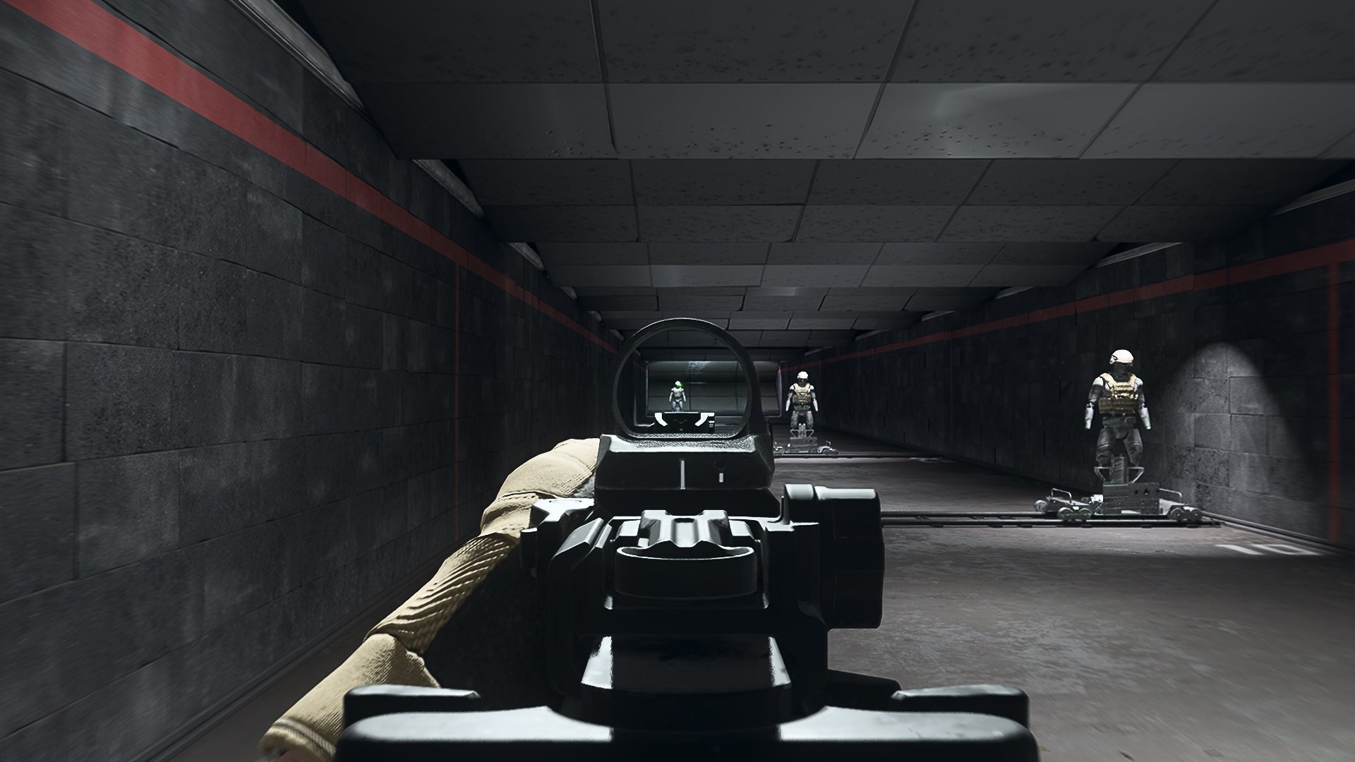 The player in Warzone 2.0 aims at a training dummy using the Cronen Mini Red Dot optic attachment.