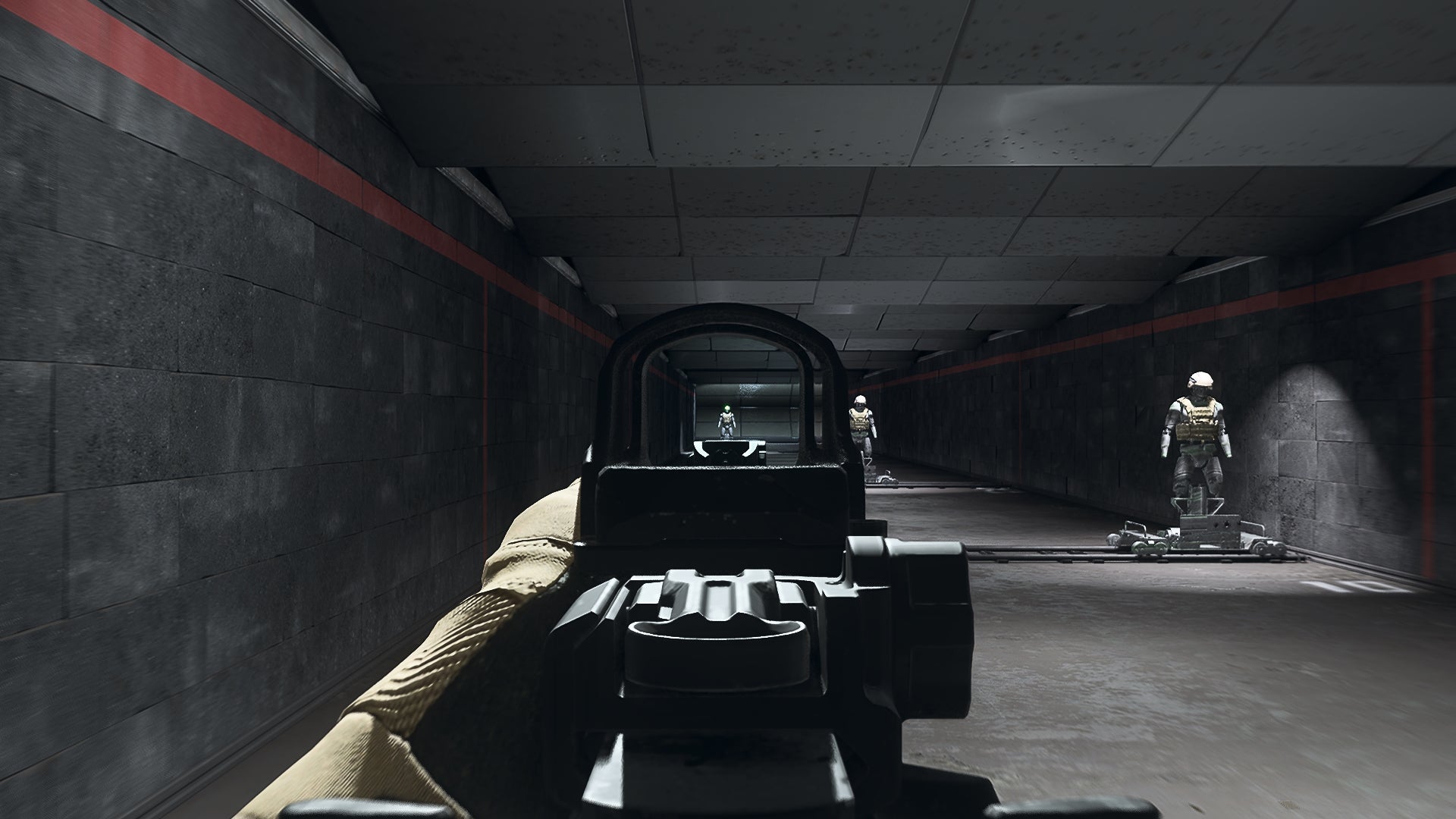 The player in Warzone 2.0 aims at a training dummy using the XRK On Point Optic optic attachment.
