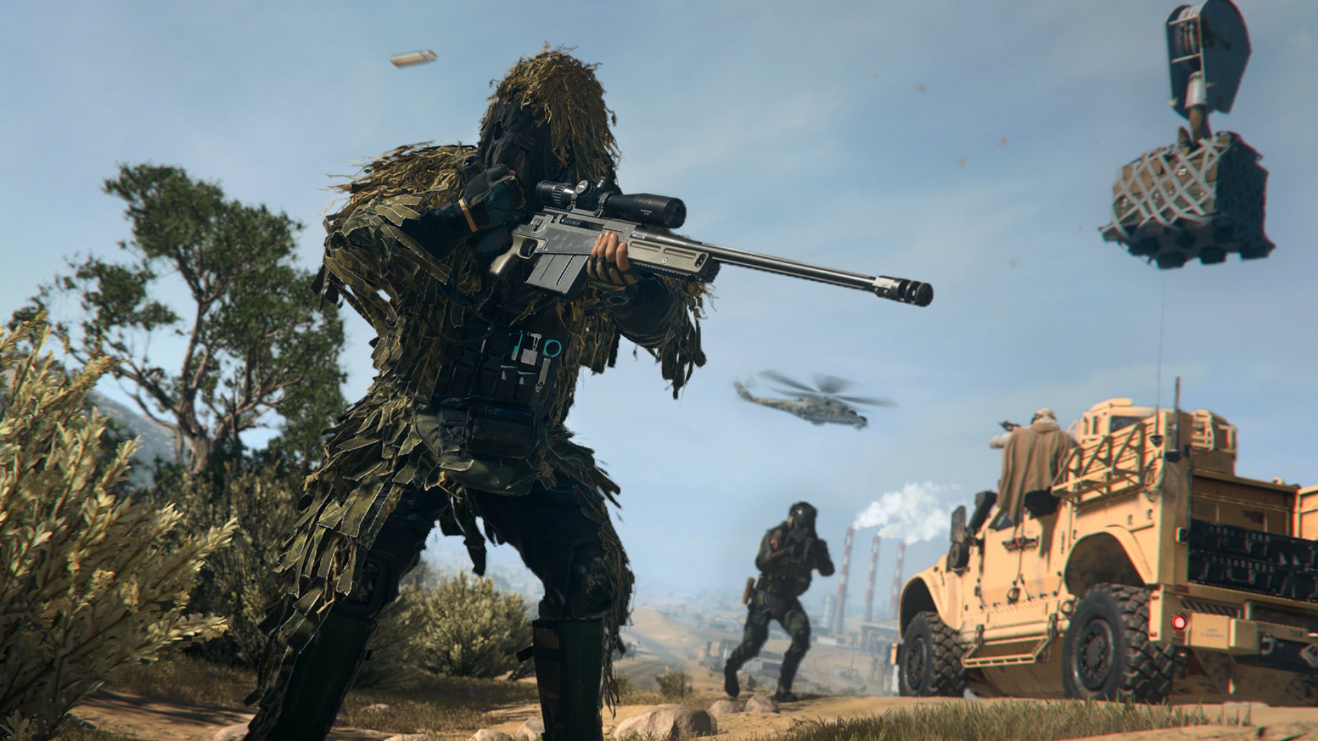 A sniper in a ghillie suit aims off-screen in Warzone 2.0.