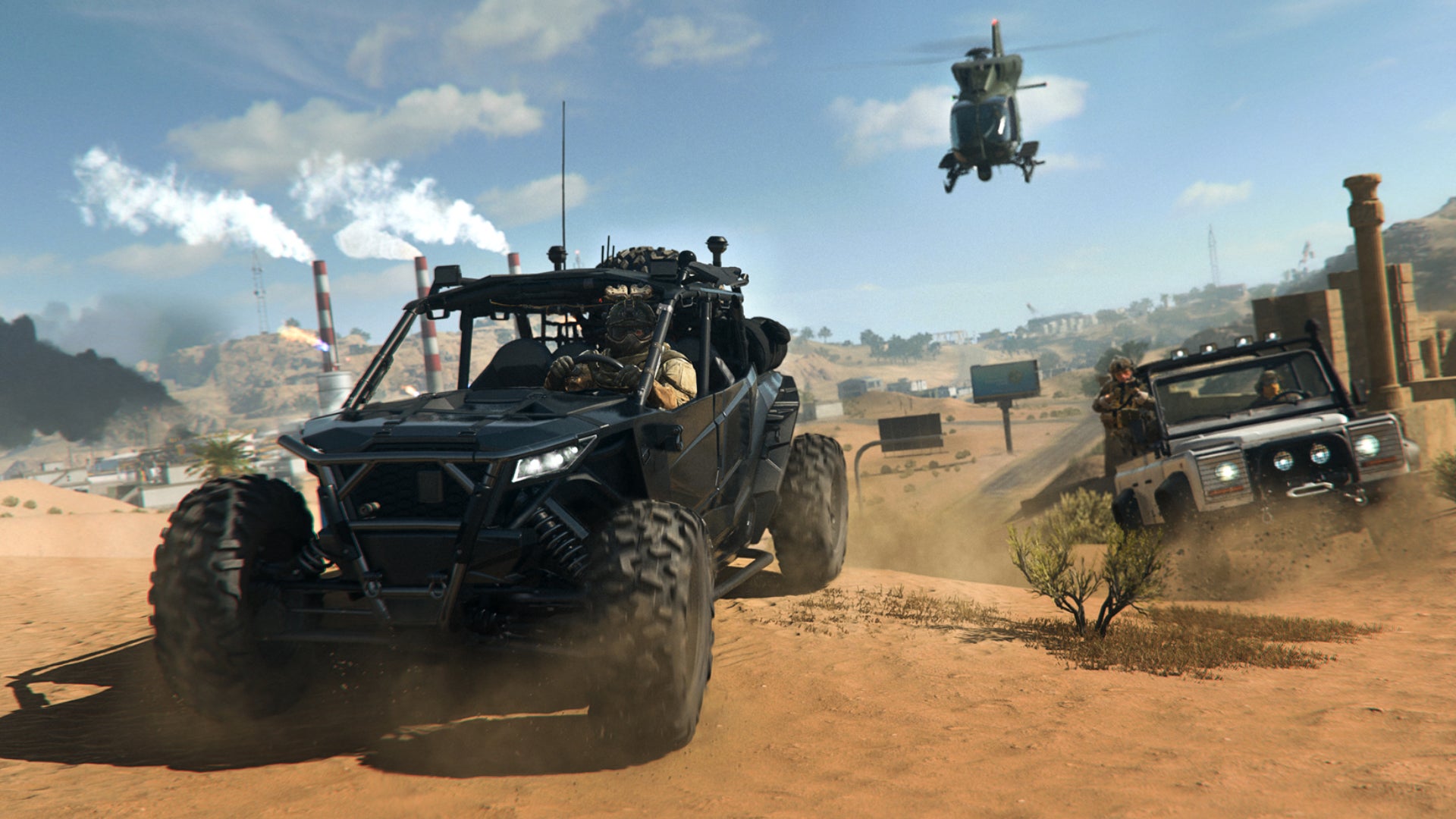 Dos vehículos terrestres y un helicóptero viajan juntos por un paisaje desértico en Warzone 2.0.