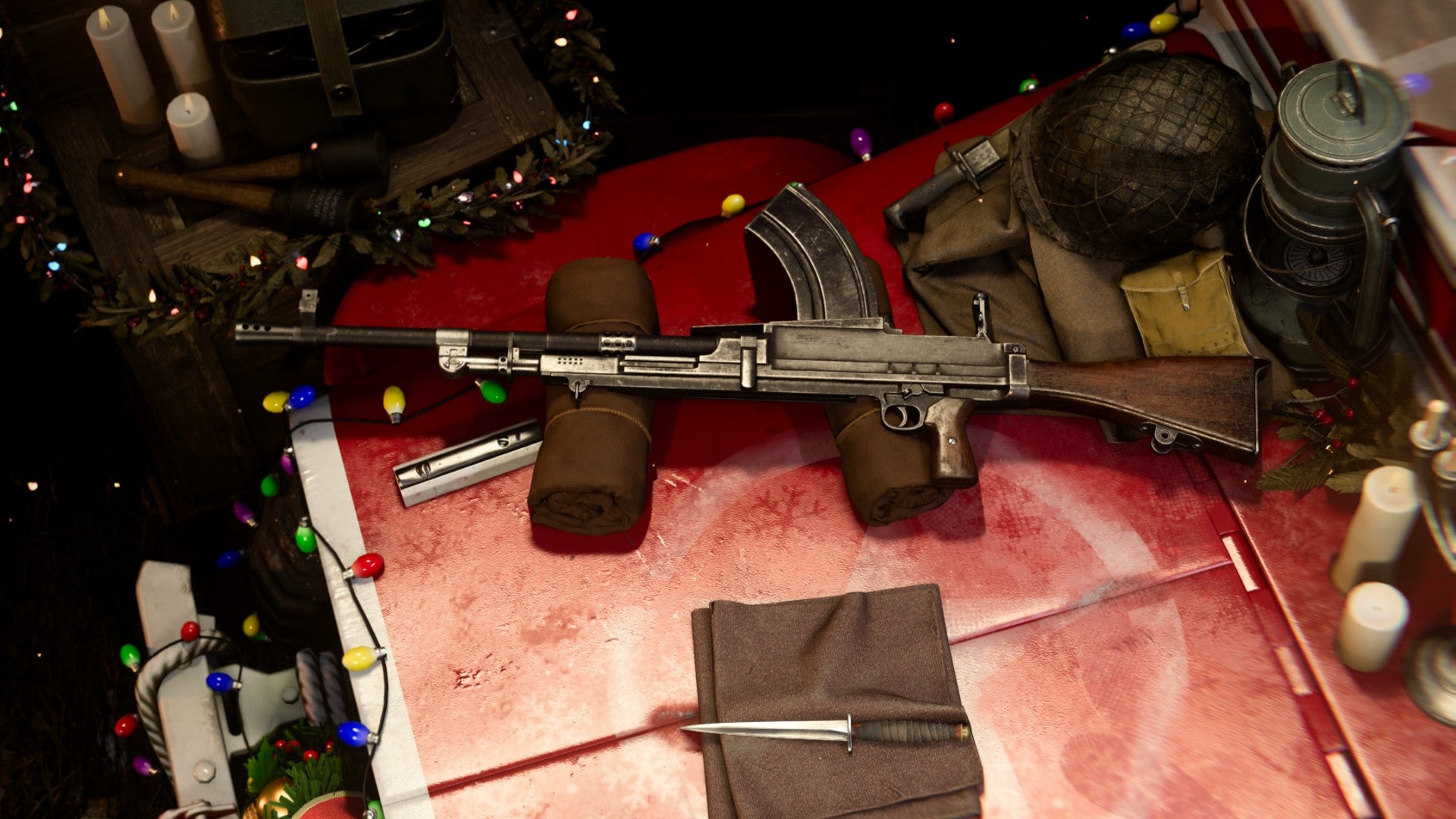 The Bren LMG on a very festive crate in the Vanguard loadout screen. It is surrounded by Christmas lights and candles, with a combat knife nearby.