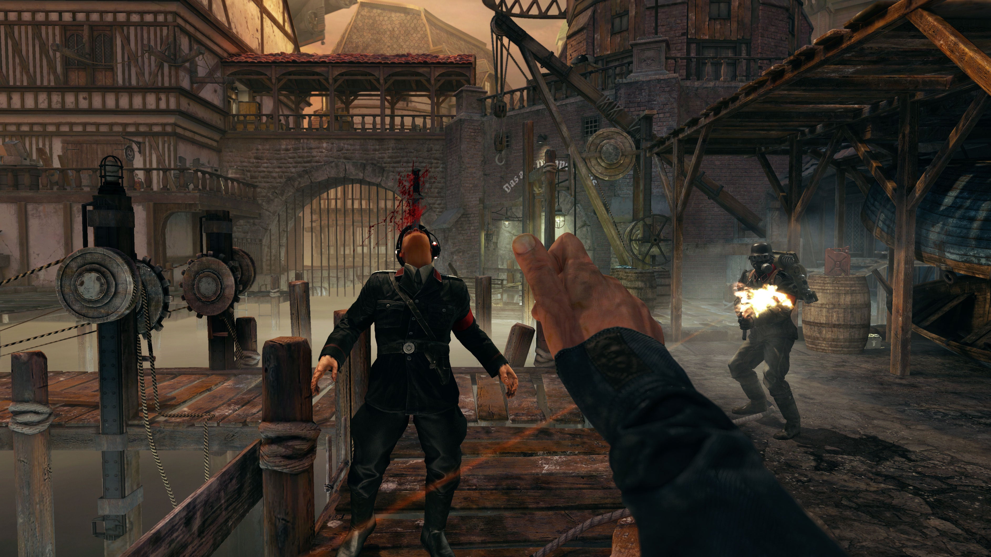 A Nazi reels back with a throwing knife in their forehead in a Wolfenstein: The Old Blood screenshot.