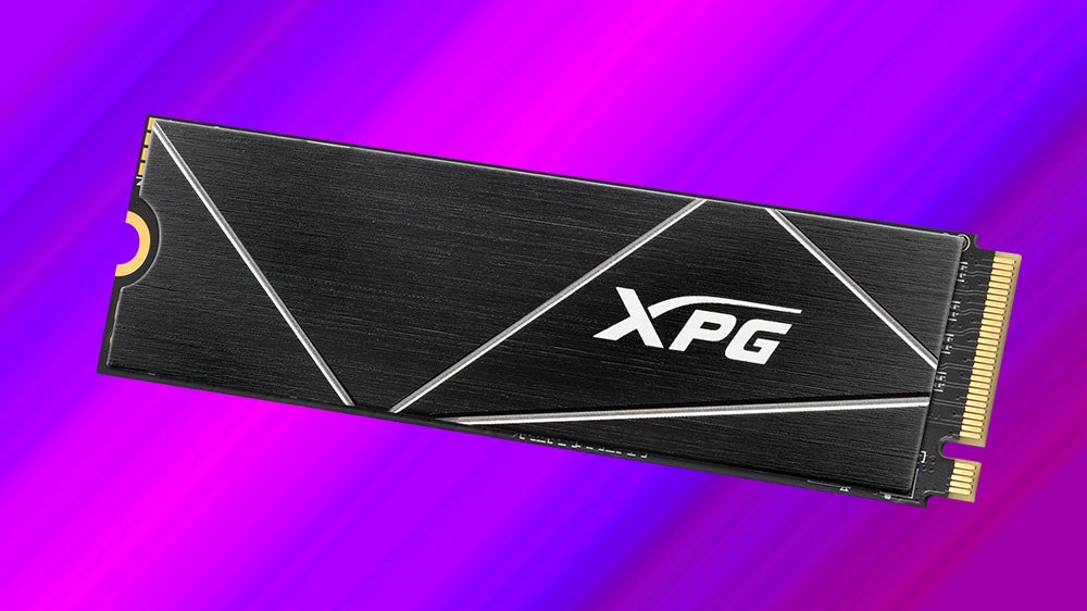 a photo of an xpg s70 blade 1tb nvme ssd, shown with a thin heatsink